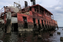 A partially sunk and rusting ferryboat in New jersey United states  by wombat 