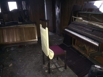 A piano in an abandoned home I konw the res isnt the best sorry