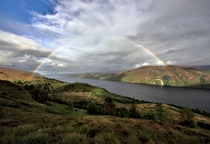 A rainbow bridge over the Loch Ness Scotland 