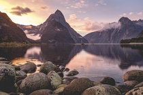 A rainy day that ended with one of my favorite sunsets ever Milford Sound New Zealand 