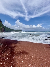 A red sand beach in Hana Maui 