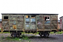 A Retired Wooden Train Car in Belgium  by Karin Counet