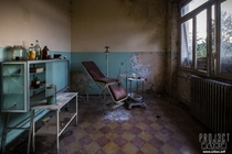 A rotting dentist chair in an abandoned orphanage in Italy x 