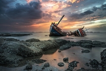 A shipwreck near Ang Sila Thailand  by Vorawit Praditbatuka