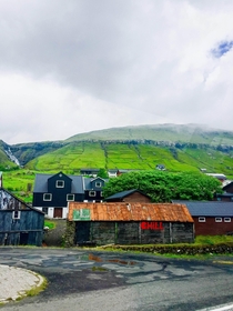A small village in Iceland taken from a moving vehicle 