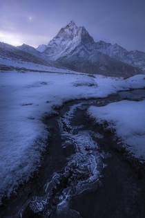A snowy morning along the trail to Everest Base Camp I spent  days in Nepal trekking and this was probably my favorite day Enough snow had fallen the night before to stick on the landscape making for awesome conditions before it melted a few hours after s