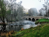 A stone bridge in the mist 