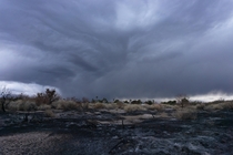 A storm cell meets a charred landscape in Henderson NV 