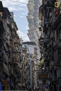 A street in Macau with the Grand Lisboa Casino looming in the background Photograph by Paul Tsui National Geographic travel photographer of the year