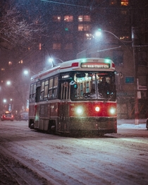 A streetcar making its way along Carlton street in Toronto Ontario