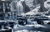 A stunning snapshot of the Frozen Scaleber Falls in the Yorkshire Dales National Park England by Chris Frost 
