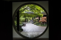 A traditional Chinese moon gate to a garden in Hangzhou China