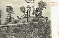 A train on a remarkable section of the Darjeeling Himalayan Railway The upper part of the loop - the fourth on the line - was originally a curve of  ft radius Improvements have been made but this loop is still known as Agony Point where trains almost over