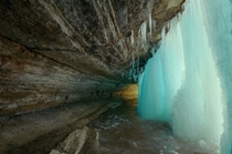 A view from behind a frozen Minnehaha Falls  X  