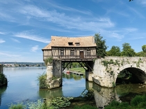 A water mill from the th the bridge and the th the mill century in France