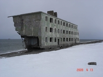 Abandoned apartment complex on the beach in Russian Kamchatka 