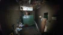 Abandoned Bathroom tucked away on an inaccessible mezzanine in a repurposed industrial warehouse Bucks County PA USA 