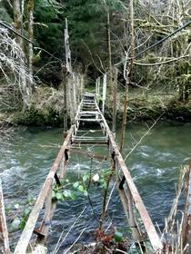 Abandoned bridge above Dordogne