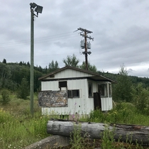 Abandoned building in an old logging yard just off the highway in British Columbia