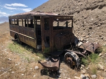 Abandoned bus with  bunk beds and a stove inside Utah