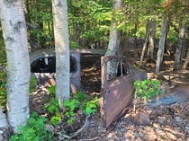 Abandoned car I came accross in the woods about ft from the shore of Lake Superior in Minnesota