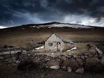 Abandoned during winter time house of shepherd at mountains Armenia Lori province