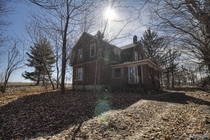 Abandoned Gambrel Styled Farm House in Rural Ontario 
