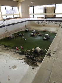 Abandoned hotel pool in Michigan taken last winter I was lucky the black sludge was frozen cant imagine the smell The place was demolished about a month ago but stood vacant for almost a decade