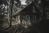 abandoned house inside the stechanka village at the chernobyl exclusion zone