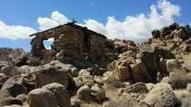 Abandoned mining shack in the desert California USA