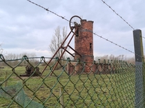 Abandoned pit head and winding gear in Derbyshire