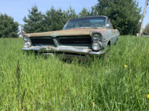 Abandoned  Pontiac Catalina sitting in a Pennsylvania field