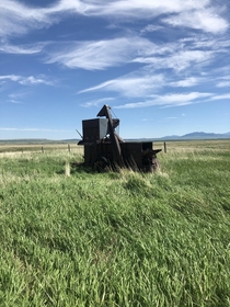 Abandoned pull type combine In the middle of Montana