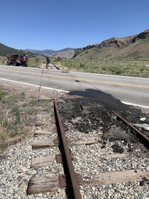 Abandoned rails paved over between Creede and South Fork Colorado