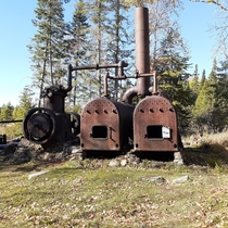 Abandoned steam engine in Allagash Maine Used to power a tram way that pulled logs from one lake to another to be floated to saw mills in the southern part of the state