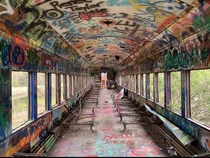Abandoned train car in the woods decorated with graffiti Lambertville NJ Picture taken spring 