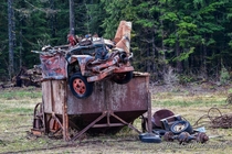 Abandoned truck dumped on top of some abandoned mining equipment Darrington Wa