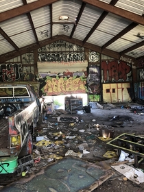 Abandoned truck in shed