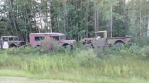 Abandoned trucks along a highway