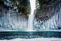 Abiqua Falls Oregon - Columnar basalt waterfall surrounded by ice 