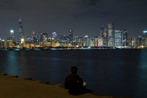 Admiring the Chicago skyline from across the harbor  Photographed by Rares Dutu