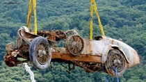 After  years at the bottom Raising the remains of a  Bugatti Roadster that had been abandoned in the depths of Lake Maggiore Swiss-Italian border  Smoots down -  photo - link in comments 