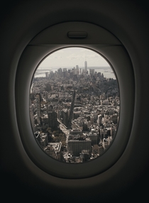 Airplane window view of Manhattan New York 