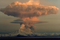 Alaska USA Ascending eruption cloud from Redoubt Volcano as viewed to the west from the Kenai Peninsula The mushroom-shaped plume rose from avalanches of hot debris pyroclastic flows that cascaded down the north flank of the volcano    Photograph by R Clu
