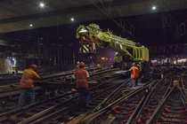 Amtrak employees work on a full replacement and renewal of track  at NYCs Penn Station 