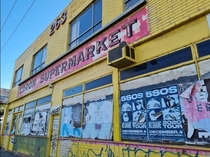 An abandoned CDROM Supermarket in Melbourne Victoria Once a port of exciting new technology it sits on a busy road where thousands of people pass it every day obsolete and disregarded