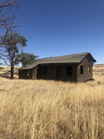 An abandoned house out on a ranch