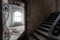 An abandoned stairway  doorway UK 