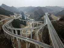 An aerial view of an intricate interchange on the Anshun-Ziyun Expressway China