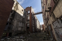 An alleyway in an abandoned textile mill 